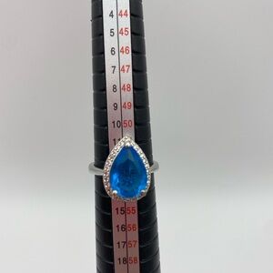 Teardrop Blue Gemstone Cocktail Ring with Crystal Halo • Silver Tone